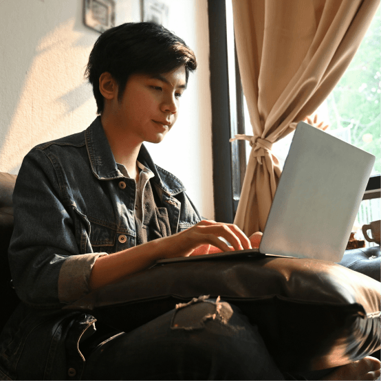 A boy with a laptop